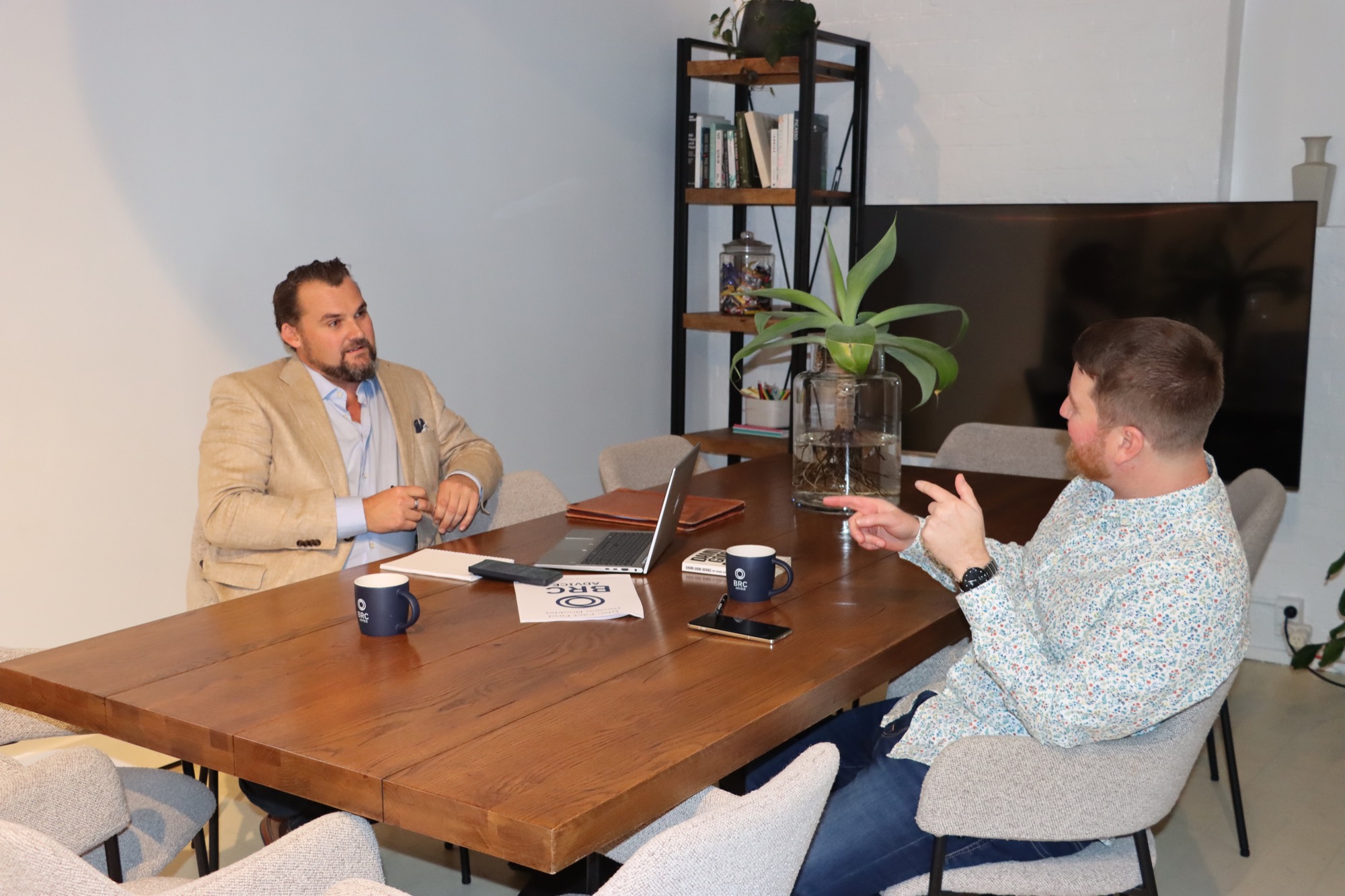 BRC Advice advisers in a client meeting